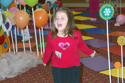 Little Girl Having Fun with Candy Land